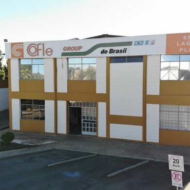 Prospettiva esterna della sede Cofle in Brasile, con facciata principale visibile.