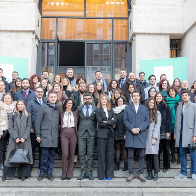 Ritratto del team TMP Group, con i membri in posa professionale e sorridenti.