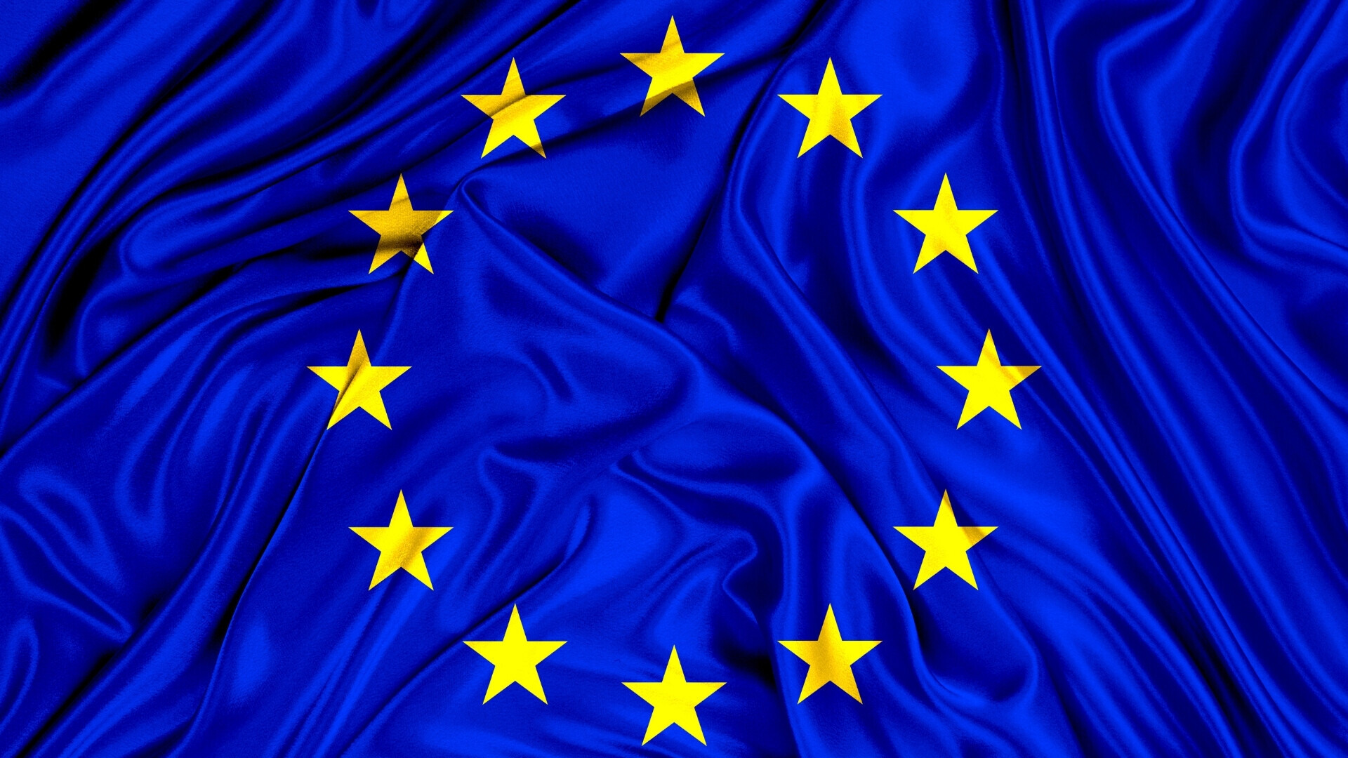 Bandiera Unione Europea blu elettrico Bandiera dell’Unione Europea su sfondo blu elettrico con cerchio di dodici stelle dorate.