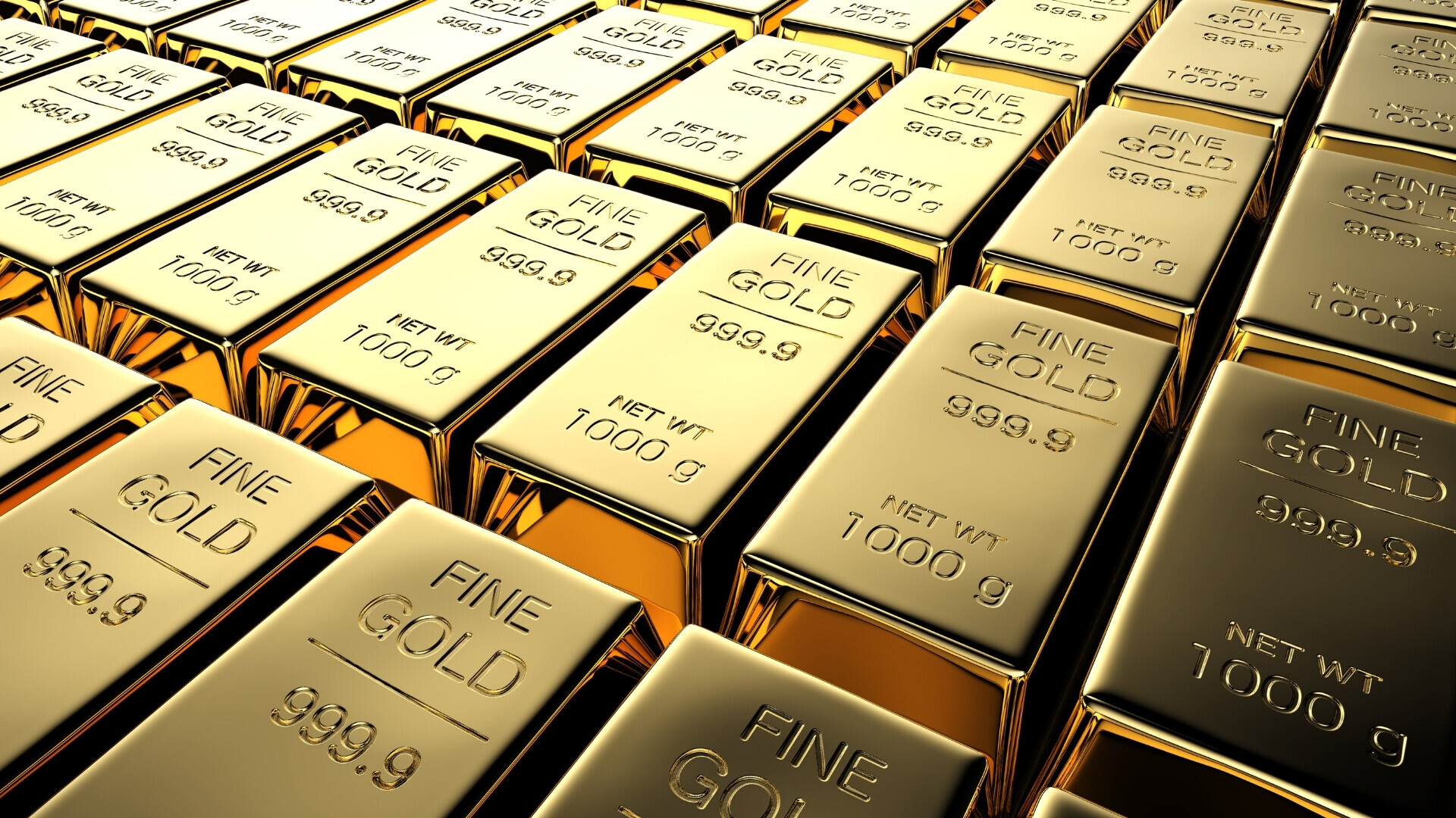 Lingotti d'oro Lingotto d’oro lucente su superficie chiara